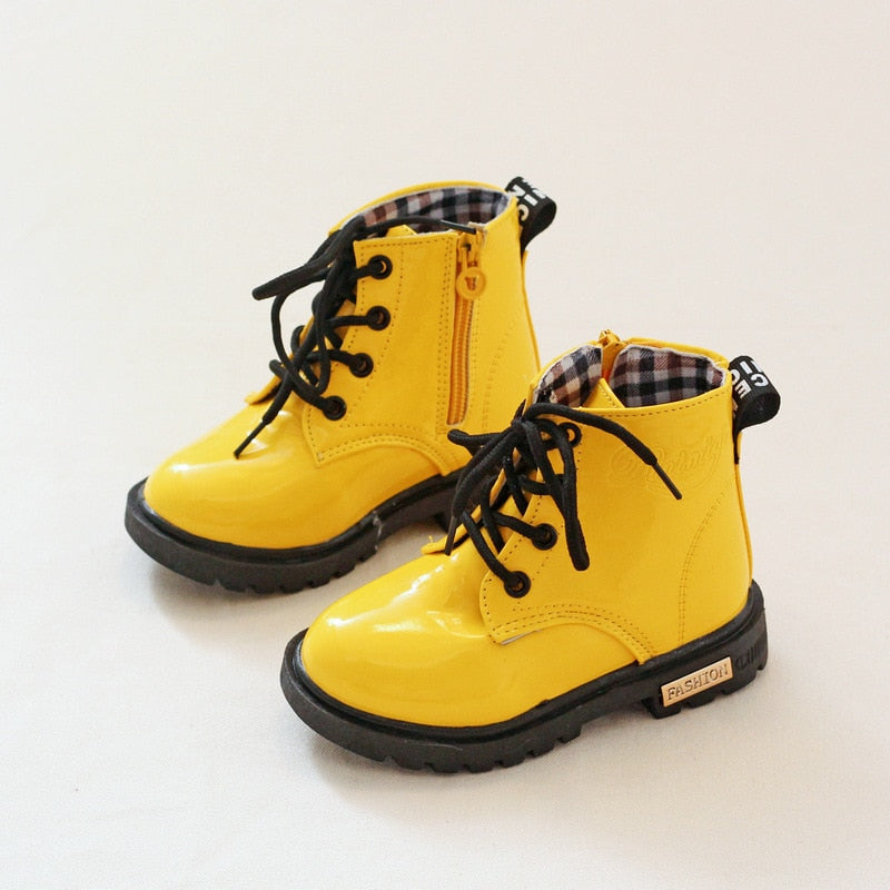 Yellow patent store leather boots